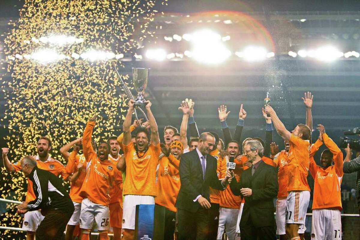 KANSAS CITY, KS - NOVEMBER 06: Members of the Houston Dynamo celebrate their victory over Sporting Kansas City after the MLS Eastern Conference Championship match at Livestrong Sporting Park on November 06, 2011 in Kansas City, Kansas.