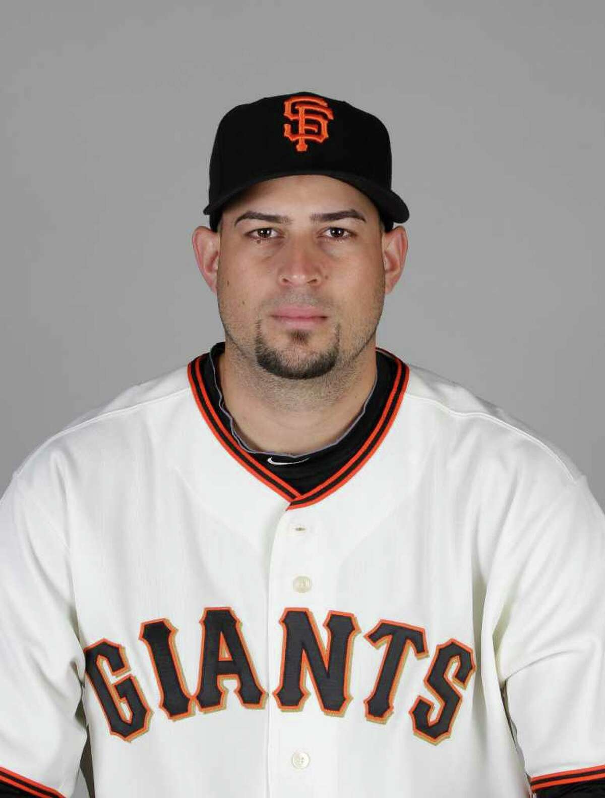 San Francisco Giants pitcher Jonathan Sanchez reacts after walking