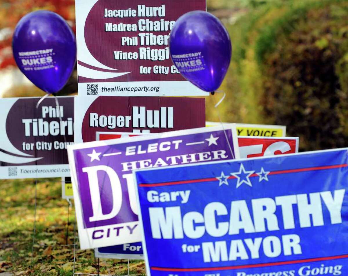 Signs dot the lawn on Election Day on Tuesday, Nov. 8, 2011, at Schenectady High in Schenectady, N.Y. (Cindy Schultz / Times Union)