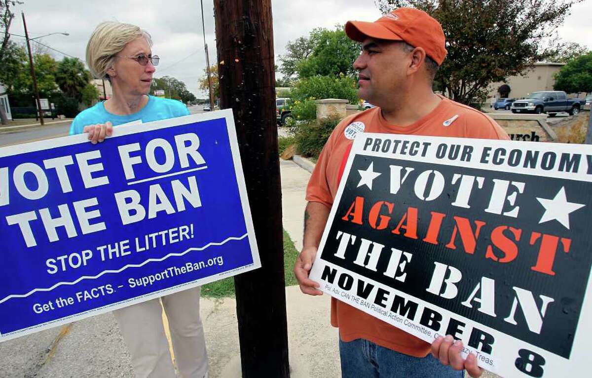 Linda Dickerson and David Martinez carry on their morning long conversation at St. Paul Lutheran Church polling station as New Braunfels citizens go to the polls to vote in the can ban issue on November 8, 2011.