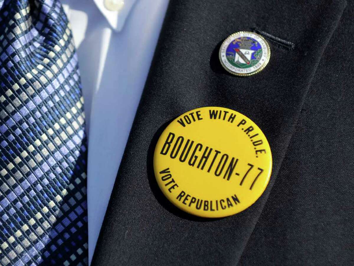 Tuesday morning Danbury Mayor Mark Boughton wore a campaign pin from the successful run for mayor by his father, Donald Boughton, in 1977. Former Mayor Boughton died last week at the age of 76. Photo taken Tuesday, Nov. 8, 2011.