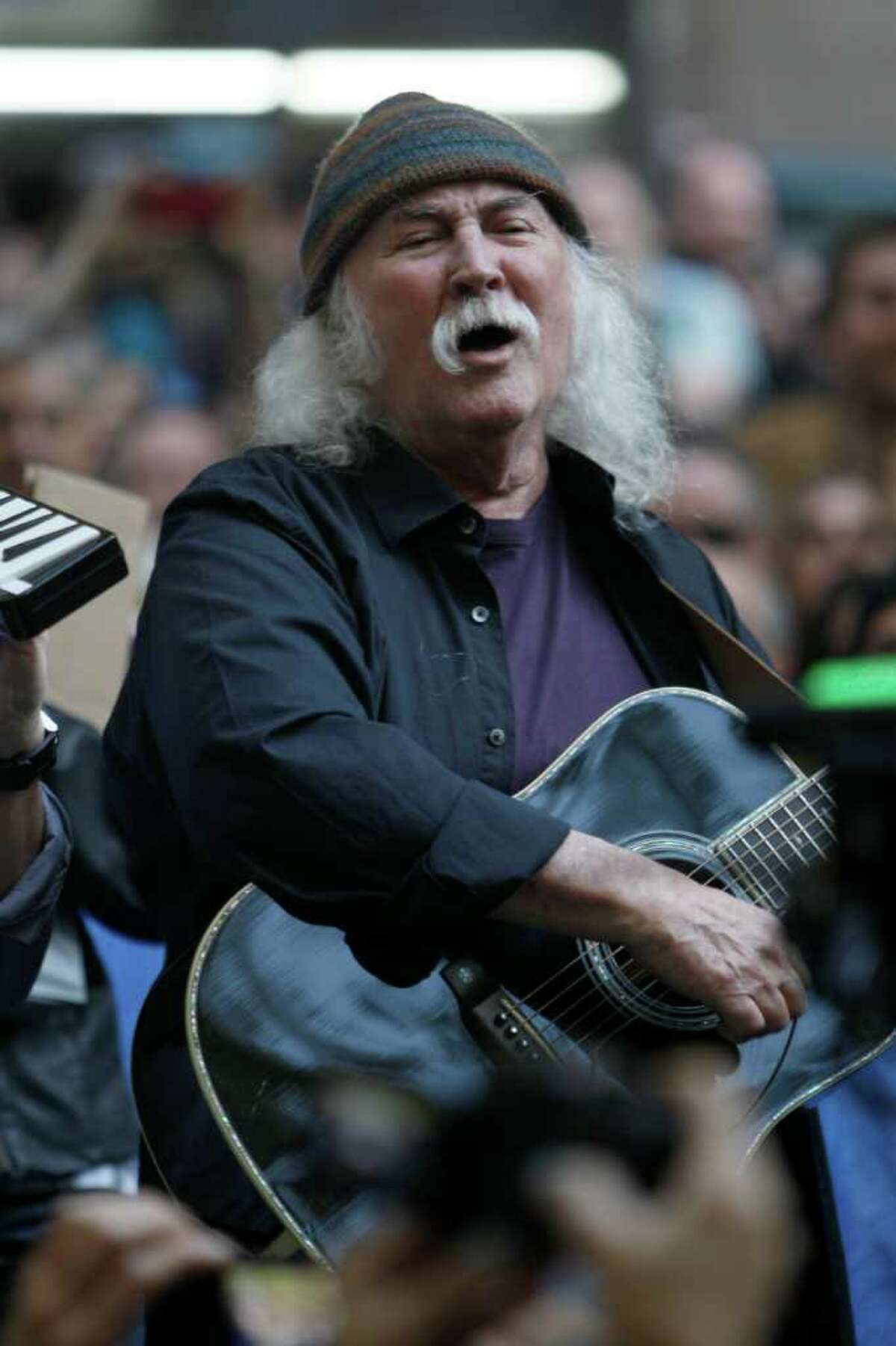 David Crosby performa at the Occupy Wall Street encampment at Zuccotti Park, Tuesday, Nov. 8, 2011 in New York. (AP Photo/Mary Altaffer)