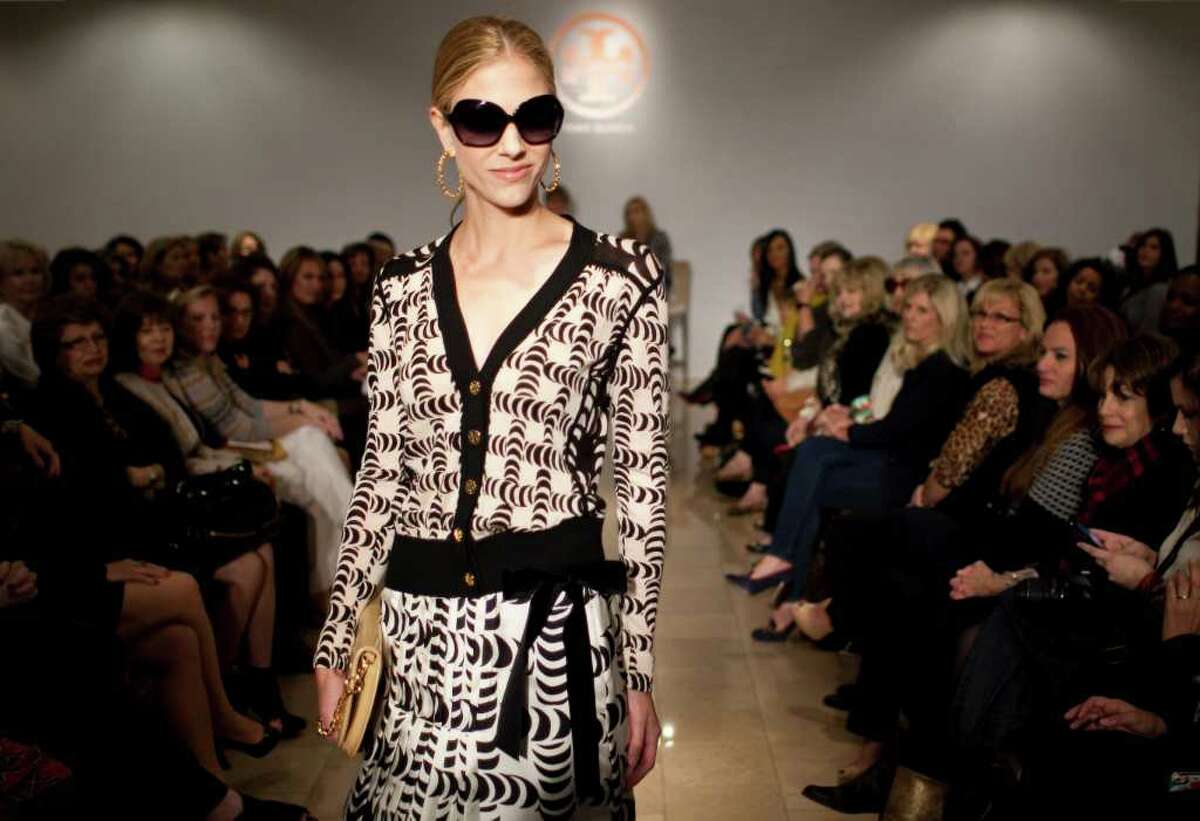 Models show Tory Burch's fall line, which includes patterns and tuxedos for women at Neiman Marcus in Houston.