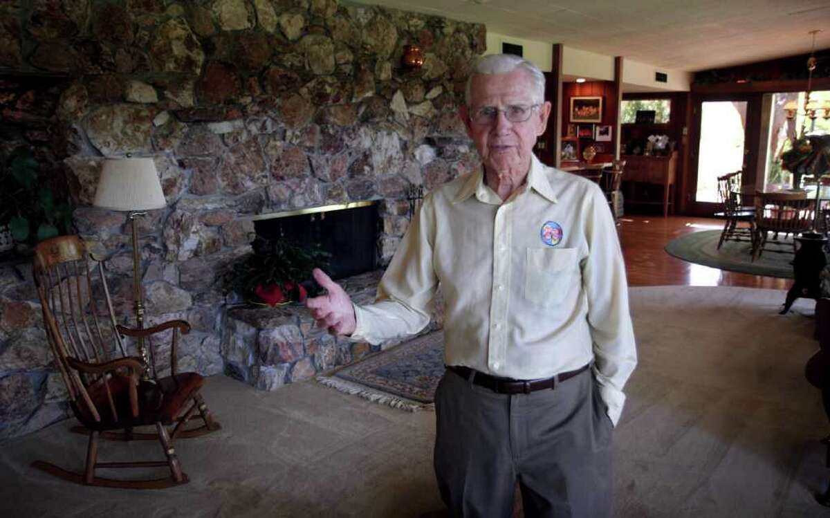 FILE - In this June 21, 2006 file photo, cartoonist Bil Keane, creator of the comic strip "Family Circus," poses in his home in Paradise Valley, Ariz. A spokeswoman for King Features Syndicate, the comic strip's distributor, says Keane died Tuesday, Nov. 8, 2011. He was 89. (AP Photo/East Valley Tribune, Paul O'Neill) MAGS OUT, NO SALES, MANDATORY CREDIT