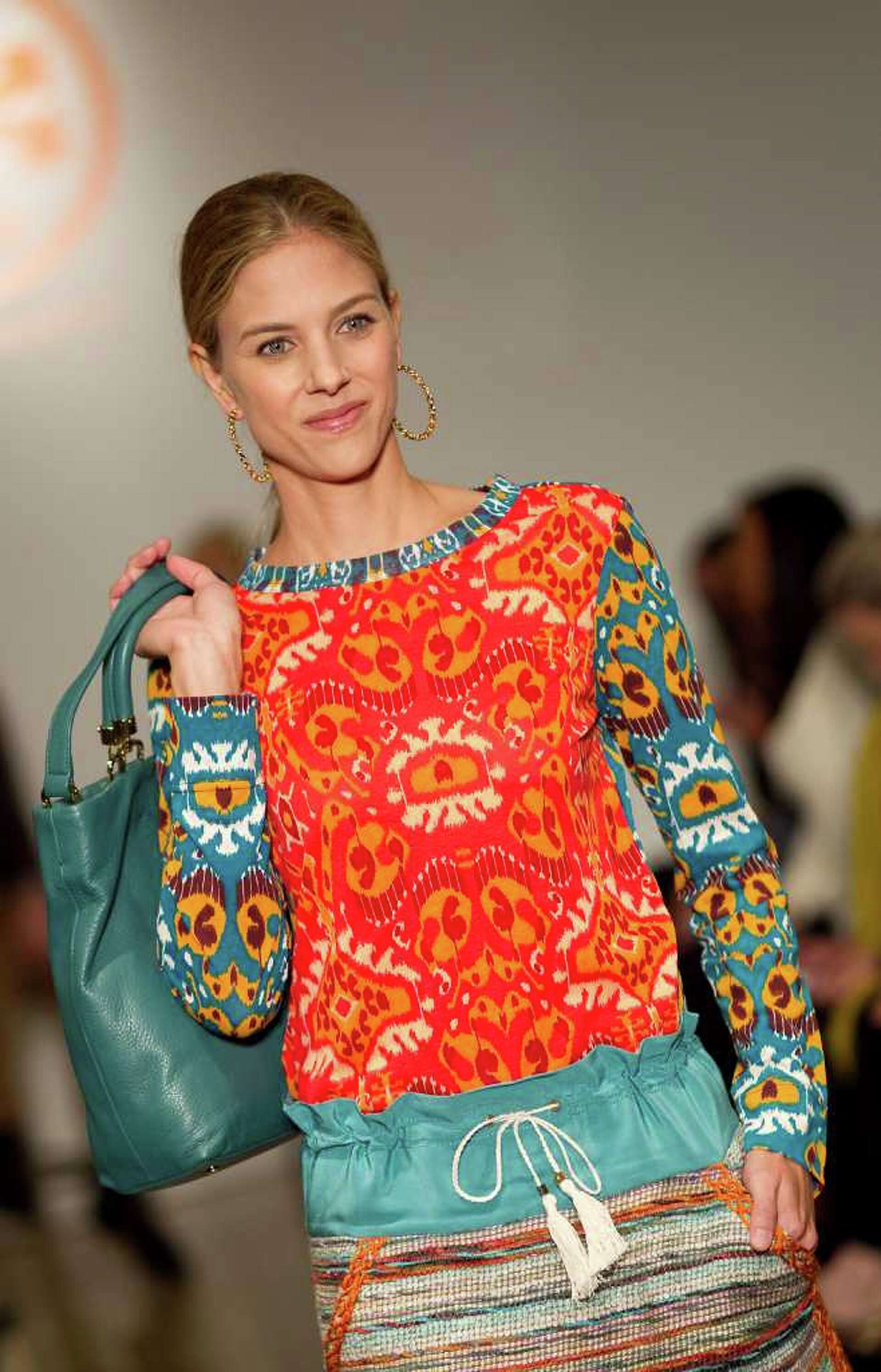 Tory Burch resonates with us