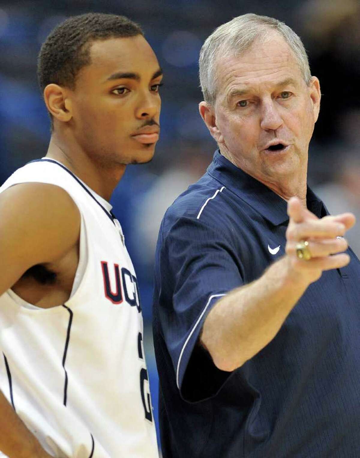 UConn coach Jim Calhoun, right, talks with Brendan Allen in the second half of an exhibition game against C.W. Post in Hartford on Sunday.
