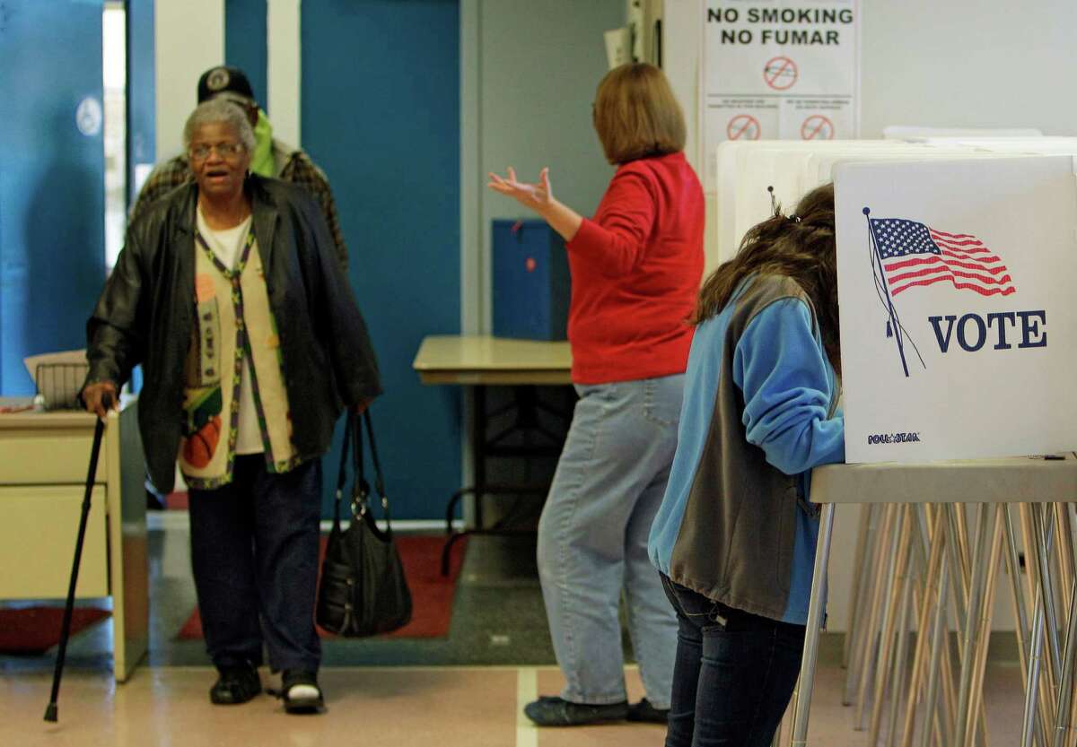 Voters take advantage of the last day of early voting at the Cuyahoga County Board of Elections, Friday, Nov. 4, 2011, in Cleveland. Statewide ballot questions, including a politically charged collective-bargaining issue, have amped up off-year election early voting.