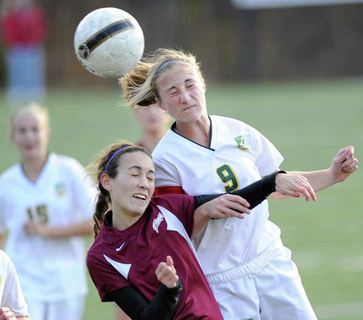Caroline Parsons, left, # 15 of St, Luke's School, goes for the header along with Sarah Whylly, # 9 of Greenwich Academy during the FAA girls soccer championship between St. Luke's School and Greenwich Academy at St. Luke's, New Canaan, Nov.11, 2011.