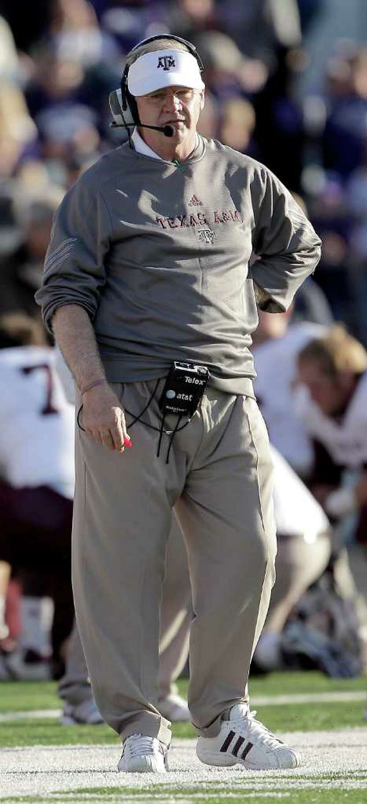 Texas A&M head coach Mike Sherman watches a play during the second quarter of an NCAA college football game against Kansas State, Saturday, Nov. 12, 2011, in Manhattan, Kan. Kansas State won the game 53-50 in quadruple overtime. (AP Photo/Charlie Riedel)