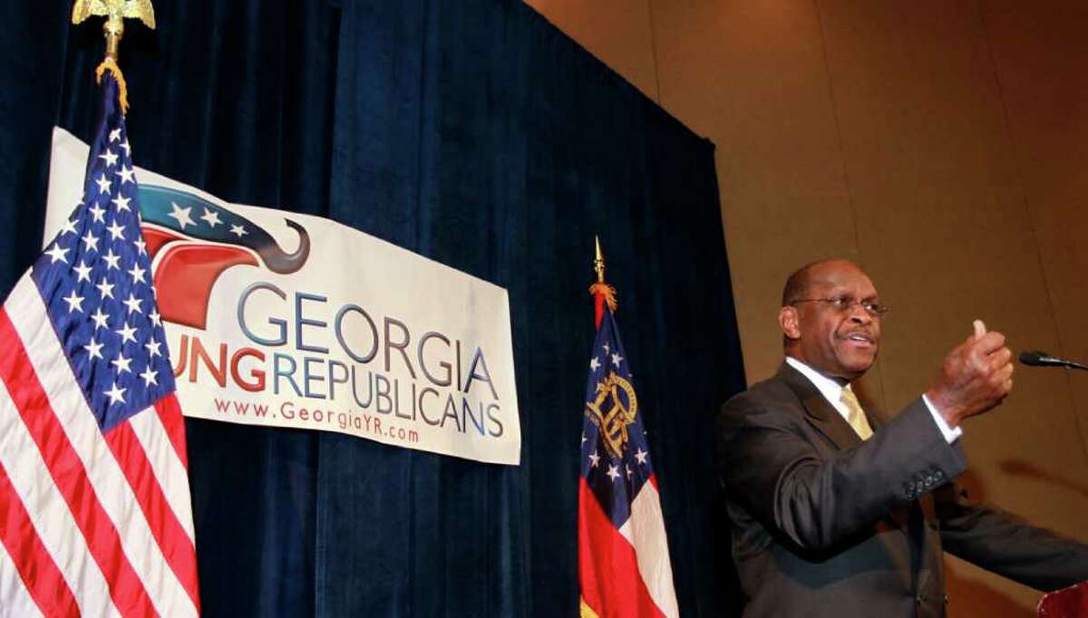 Republican presidential candidate Herman Cain speaks to the board of The Federation of Young Republicans Saturday, Nov. 12, 2011, in Atlanta. (AP Photo/John Bazemore)