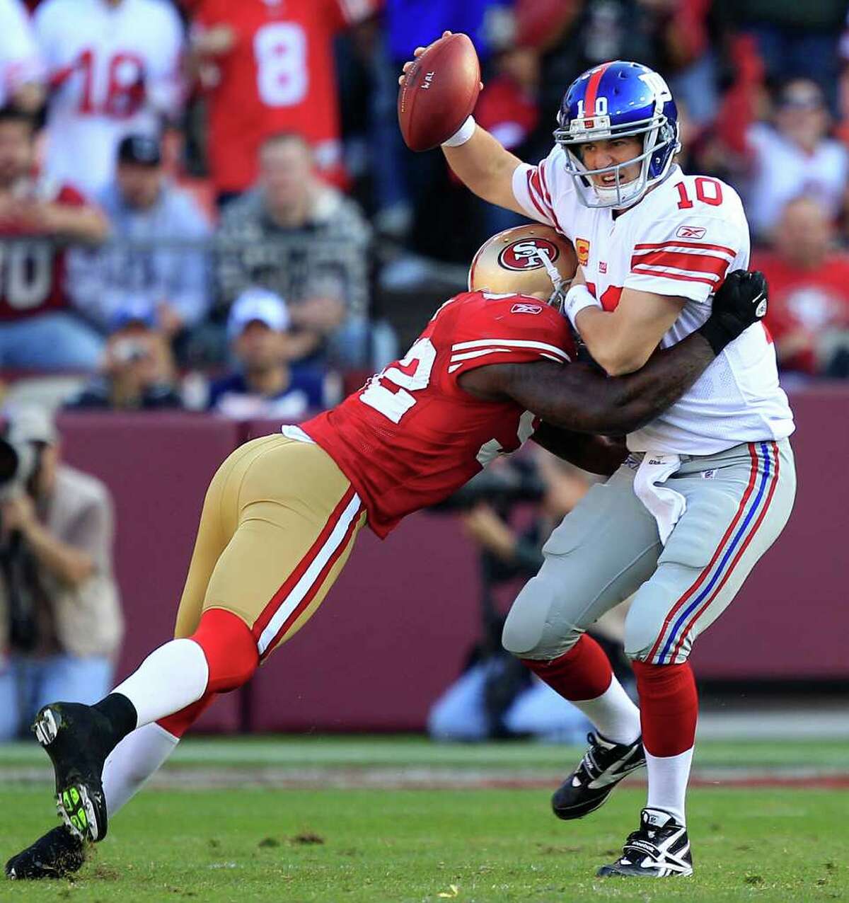 FILE - San Francisco 49ers linebacker Patrick Willis (52) celebrates after  sacking New York Giants quarterback Eli Manning in the third quarter of an  NFL football game in San Francisco, Sunday, Nov.