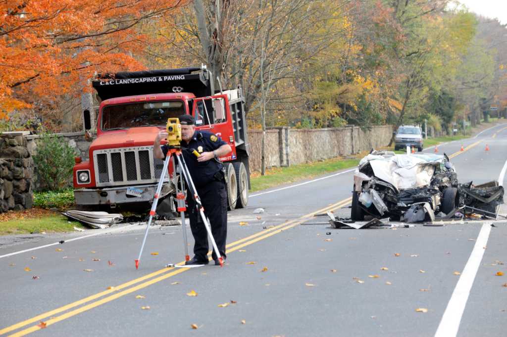 Woman severely injured in dump truck crash on North Street