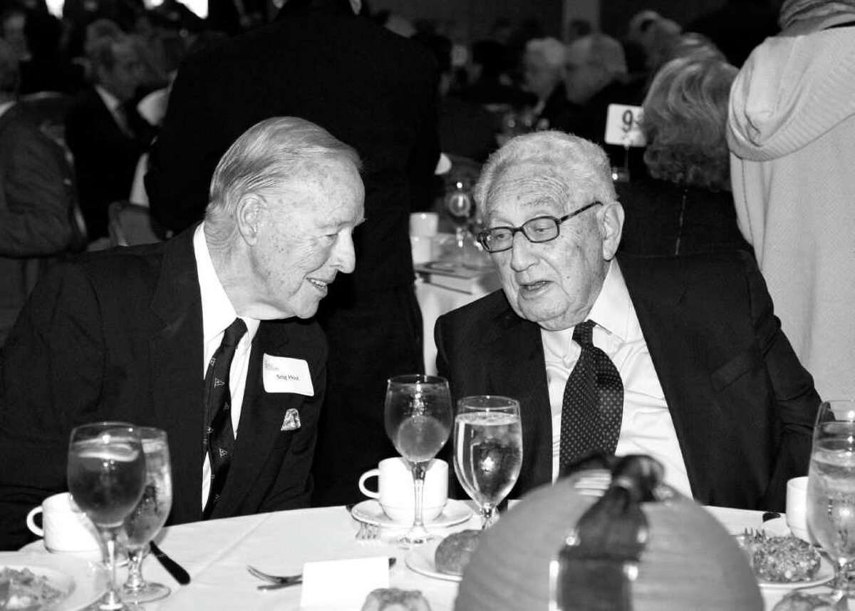 Greenwich resident Stig Host speaks with Henry Kissinger at a recent Family Centers luncheon. The former Secretary of State was speaking at the event about U.S./China relations.