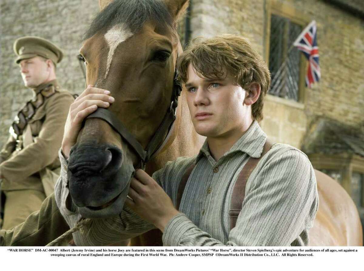 "WAR HORSE" DM-AC-00047 Albert (Jeremy Irvine) and his horse Joey are featured in this scene from DreamWorks Pictures' "War Horse", director Steven Spielberg's epic adventure for audiences of all ages, set against a sweeping canvas of rural England and Europe during the First World War. Ph: Andrew Cooper, SMPSP DreamWorks II Distribution Co., LLC.  All Rights Reserved.