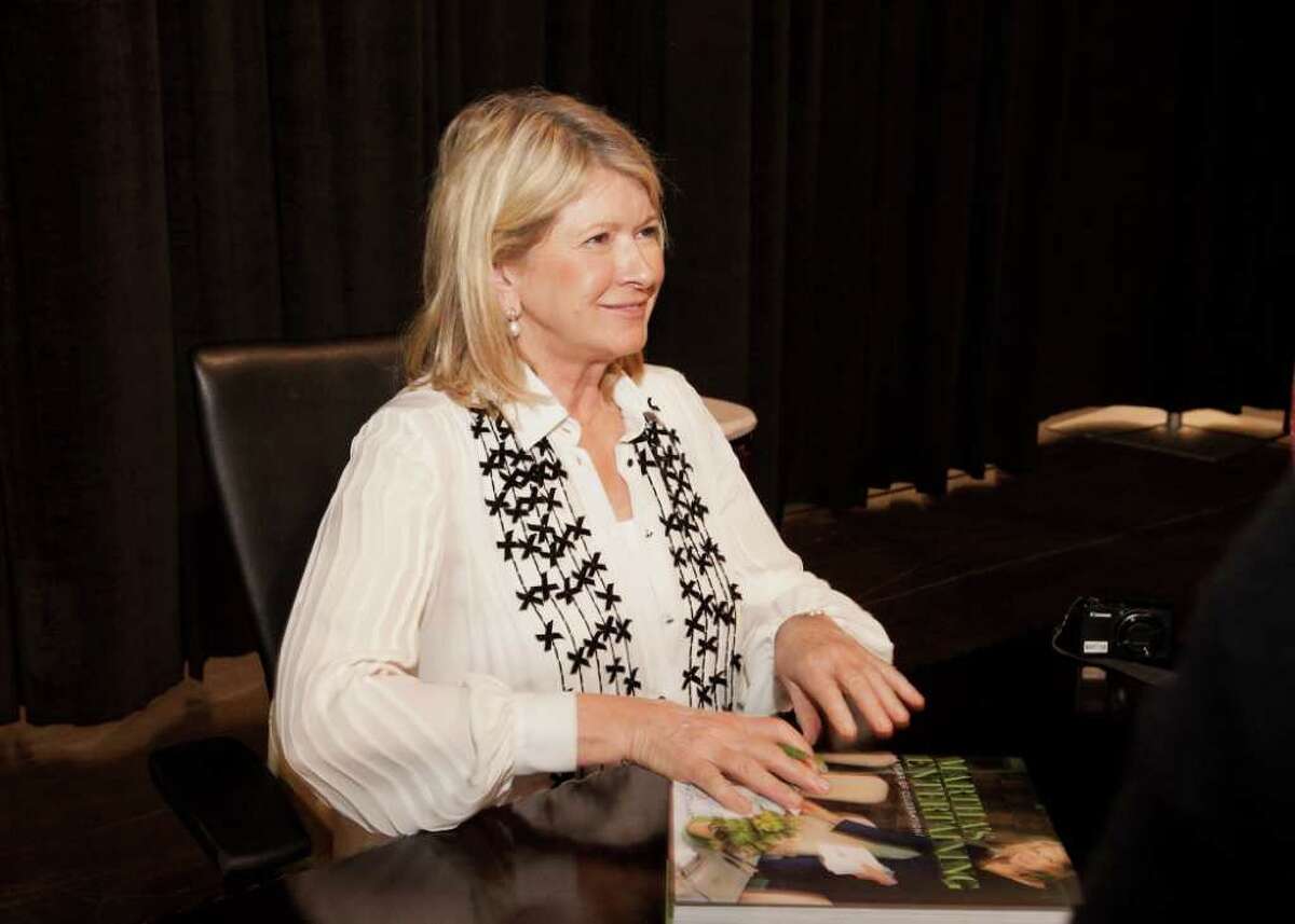 Martha Stewart signed copies of her new book Saturday after the Theta Charity Antique Show.