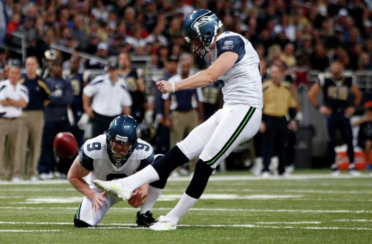 ST. LOUIS, MISSOURI - NOVEMBER 20: Seattle Seahawks place kicker Steven Hauschka #4 kicks against the St. Louis Rams for a field goal in the first half of the game November 20, 2011 at the Edward Jones Dome in St. Louis, Missouri.