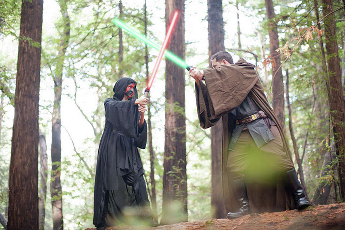 Are these the greatest, geekiest engagement photos ever? One Bay Area couple eschewed the classic poses and generic outfits of a typical photo shoot, opting for lightsabers instead. The resulting photos, shot by Michael James of Michael James Photography, do an incredible job of capturing the couple's creative spirit. Here are some of our favorite shots, but you can see them all on the Michael James Photography website.