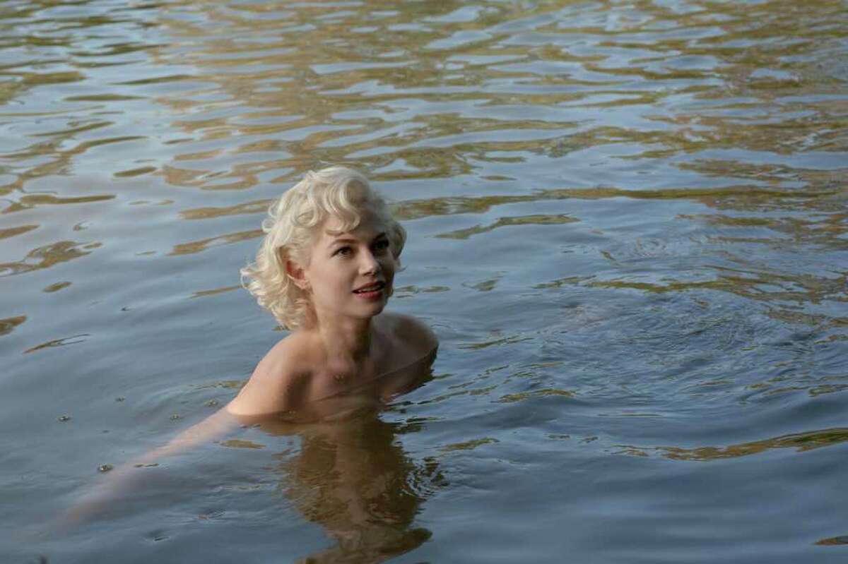 Michelle Williams portrays Marilyn Monroe , clashing with Laurence Olivier and enchanting an errand boy.