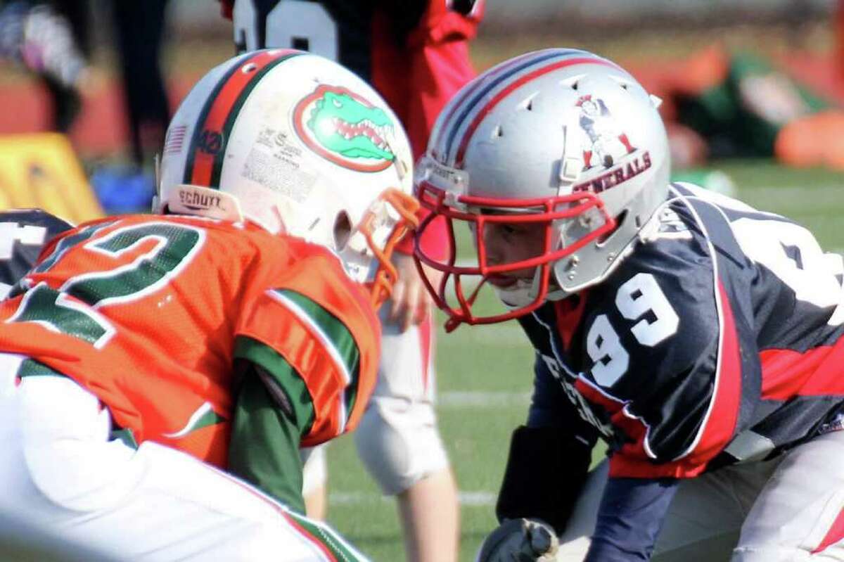 Cristobal Isaacs of the Bantam Generals looks for a sack during the GYFL championship.