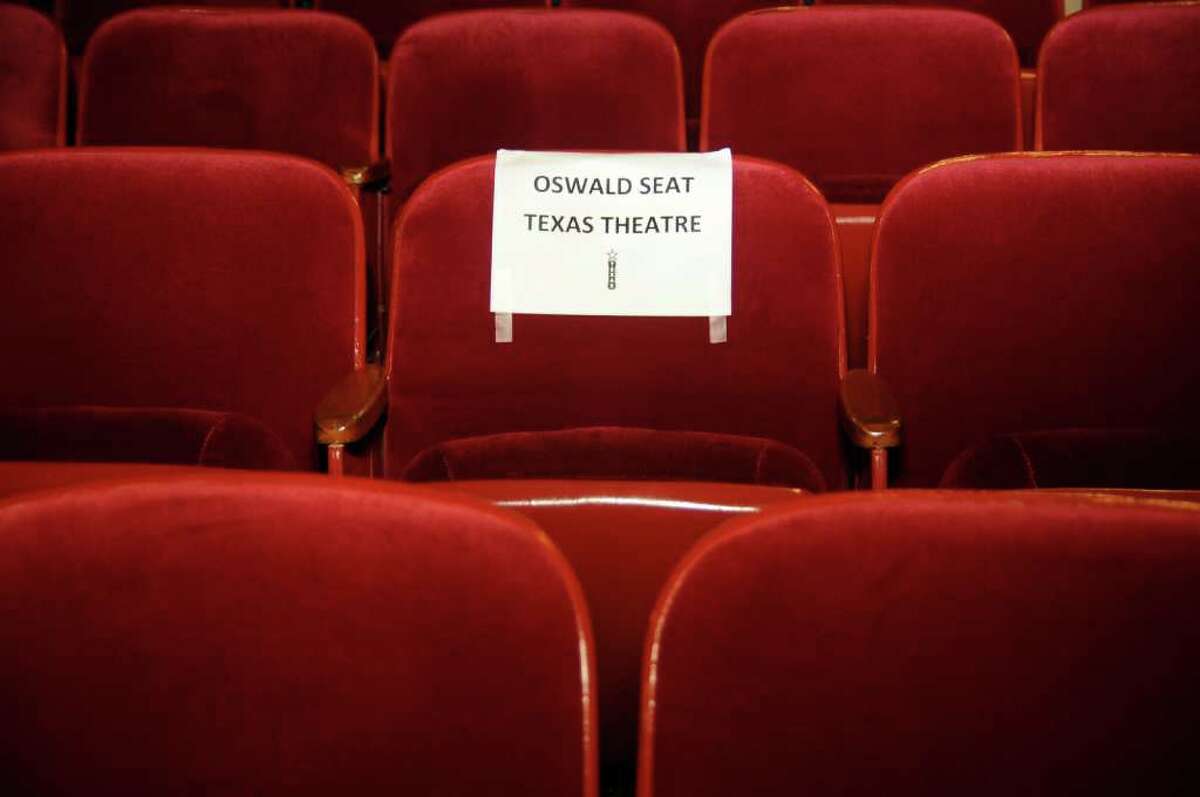 The seat where President John F. Kennedy assassin Lee Harvey Oswald was sitting when he was arrested is shown at the Texas Theater Tuesday, Nov. 22, 2011, in Dallas. Tuesday marked the 48th anniversary of President Kennedy's assassination. (AP Photo/Jeffrey McWhorter)