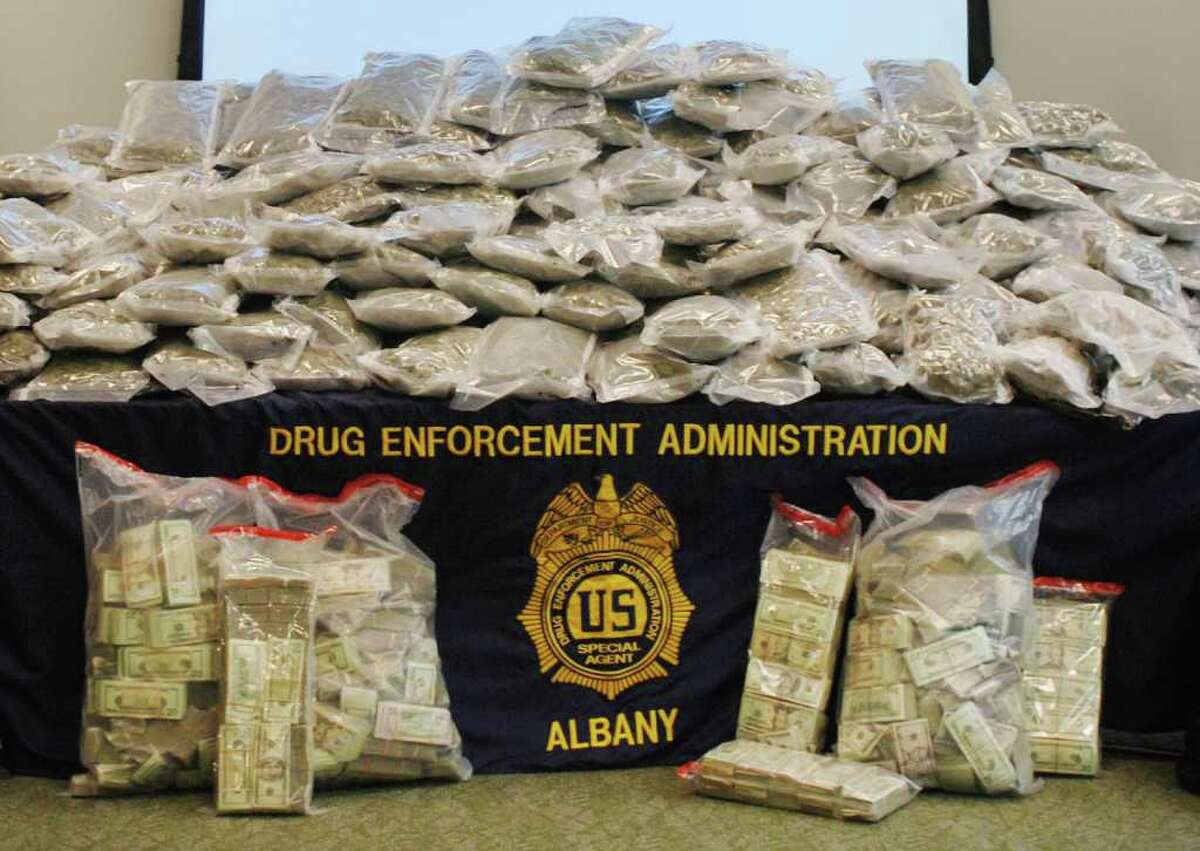 Authorities said they seized nearly 400 pounds of pot from a truck driven by former mountain biking world champion Melissa "Missy" Giove and, and from Eric Canori's home outside Saratoga Springs. (U.S. Depatment of Justice) Times Union