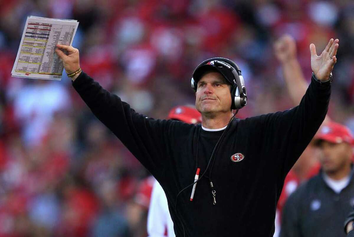 Harbaugh brothers take 49ers, Ravens to Super Bowl