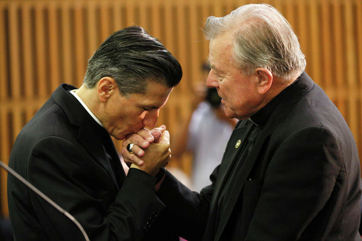 Bishop John W. Yanta (right) died on Saturday, August 6 at his home in San Antonio. 