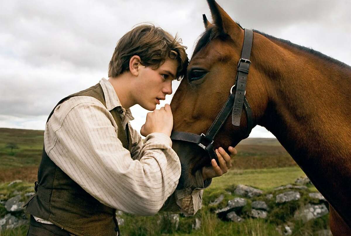 Albert (Jeremy Irvine) and his horse Joey are featured in this scene from DreamWorks Pictures' "War Horse", director Steven Spielberg's epic adventure and an unforgettable odyssey through courage, friendship, discovery and wonder. Ran on: 11-20-2011 Jeremy Irvine in War Horse..