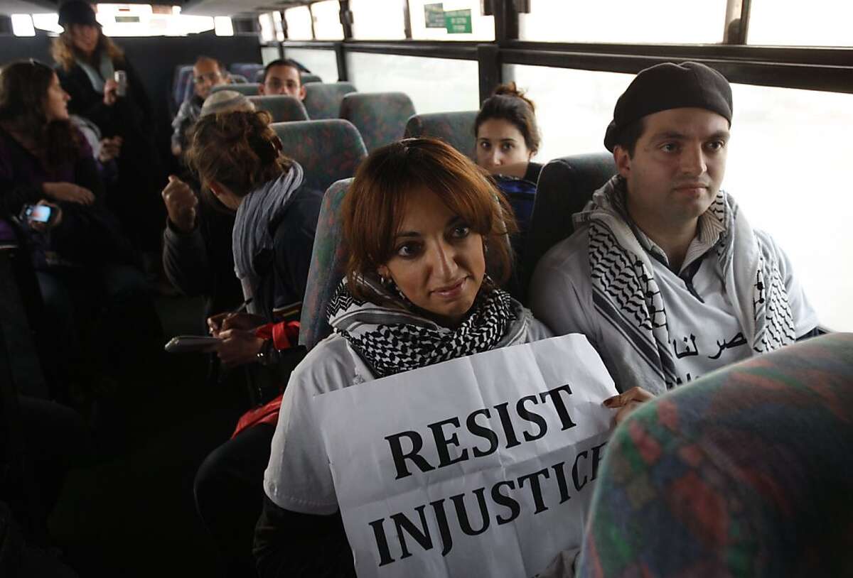Palestinian 'Freedom Riders' dragged off bus