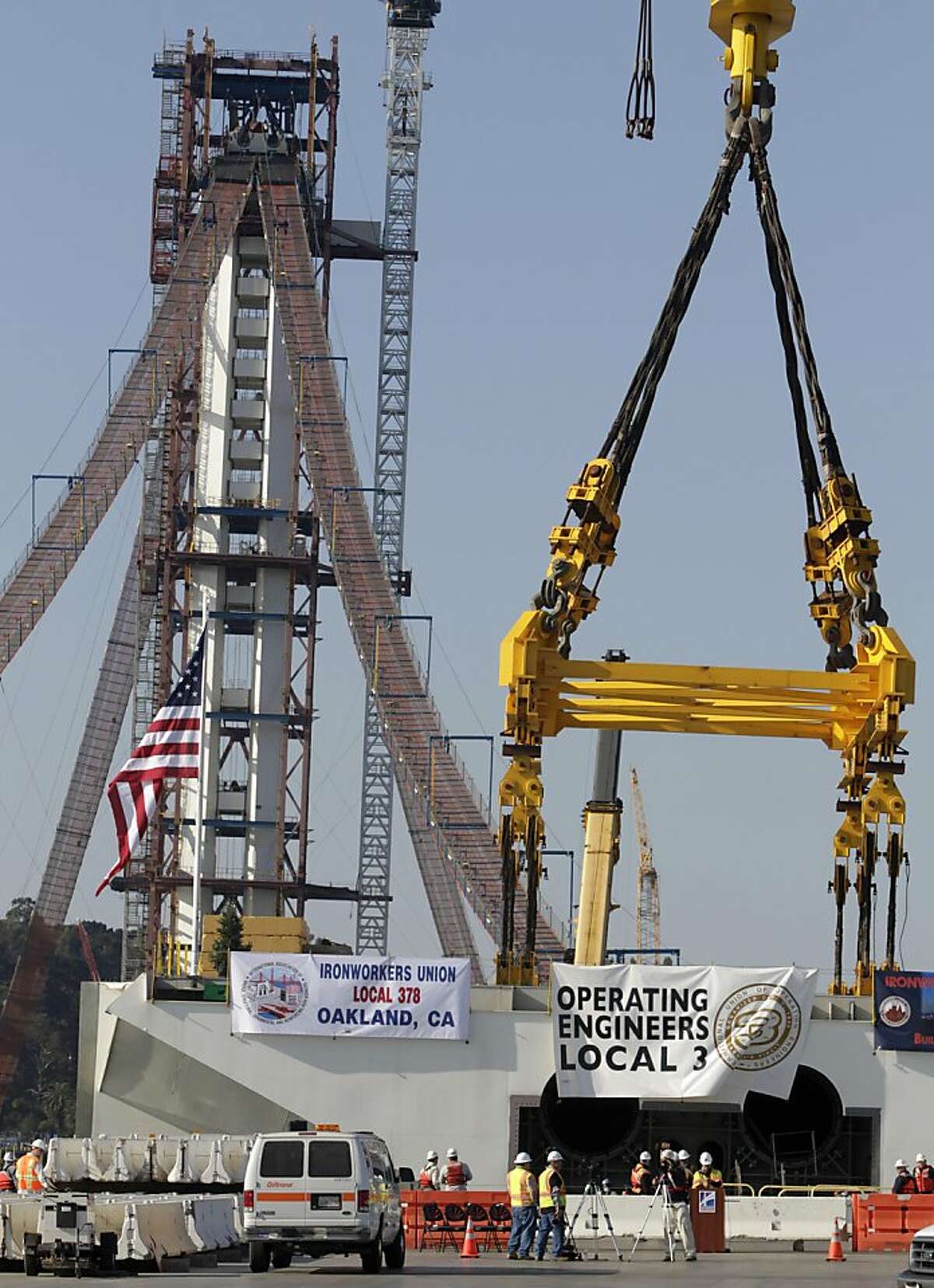 The final section of the new eastern span of the Bay Bridge is lowered, very meticulously, into place in San Francisco, Calif. on Friday, Oct. 28, 2011.