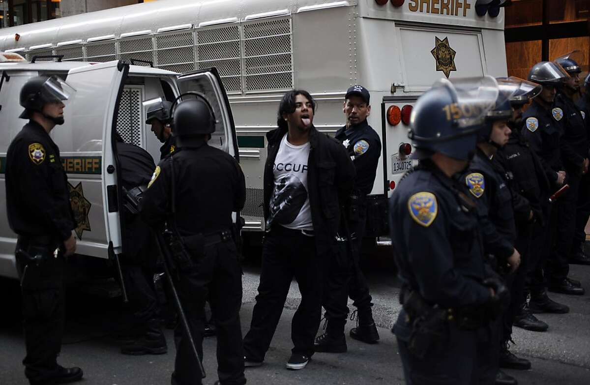 Dozens of Occupy protesters arrested at bank sit-in