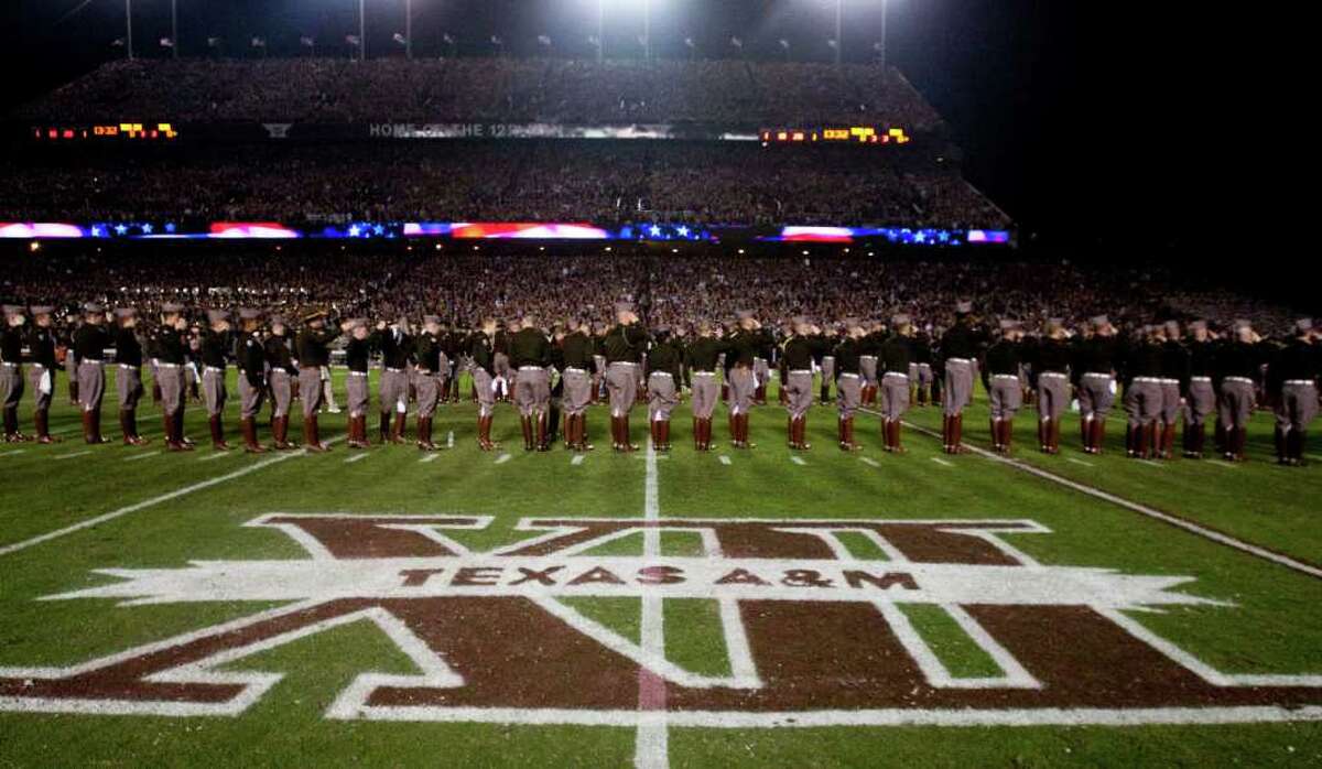 The Texas A&M Corps of Cadets line up on the field before an NCAA college football game between Texas A&M and Texas at Kyle Field Thursday, Nov. 24, 2011, in College Station. ( Brett Coomer / Houston Chronicle )