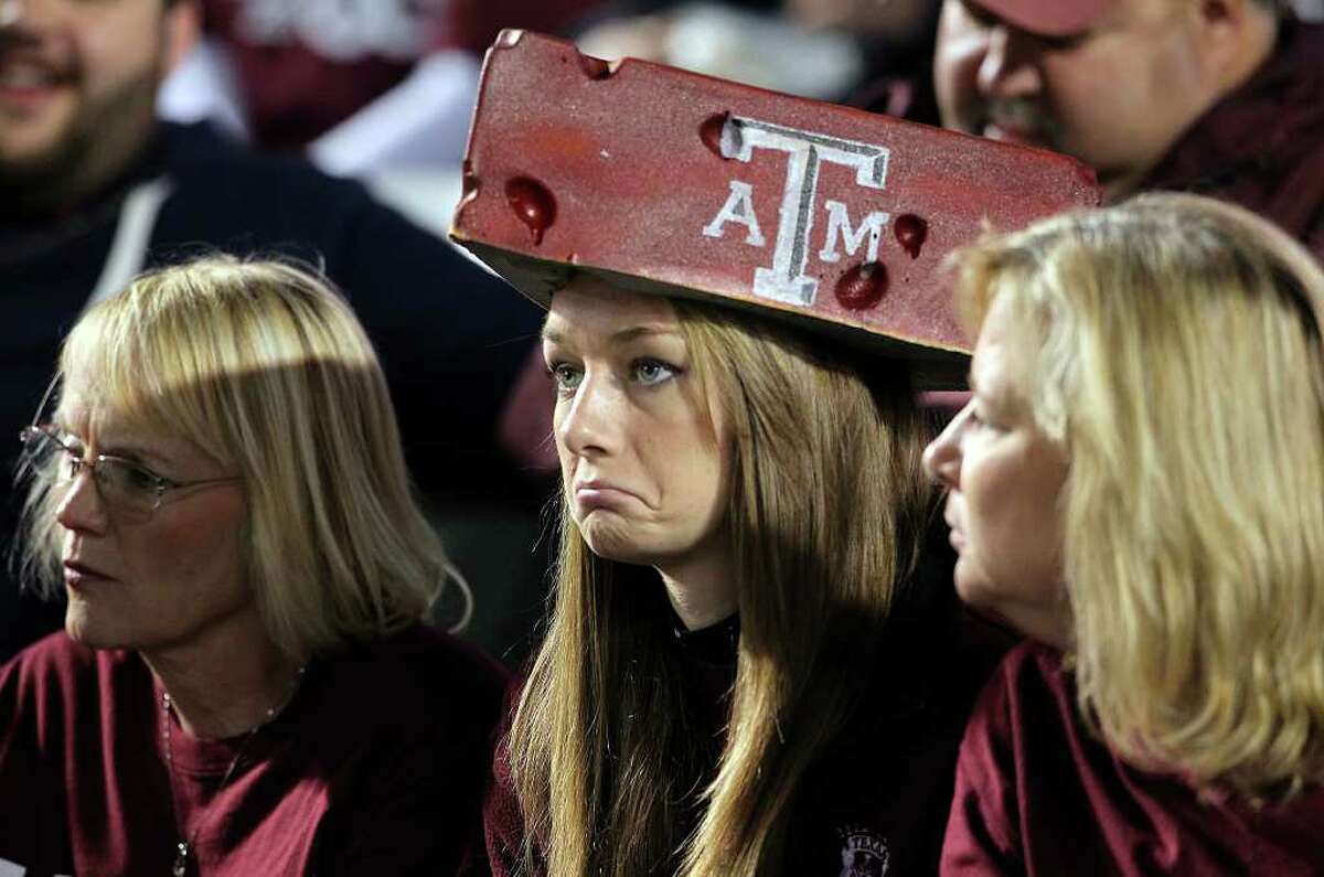 An Aggie fan reacts as Texas A&M hosts UT at Kyle Field in College Station on November 24, 2011.