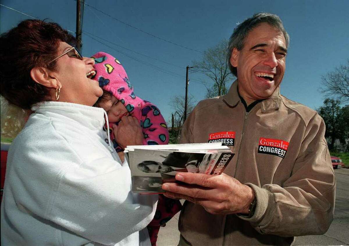 Charlie Gonzalez shares a laugh with Rosie Moran and her 2-year-old granddaughter, Lindsey Dubbles before Moran went in to vote at Holy Family Church in 1998.