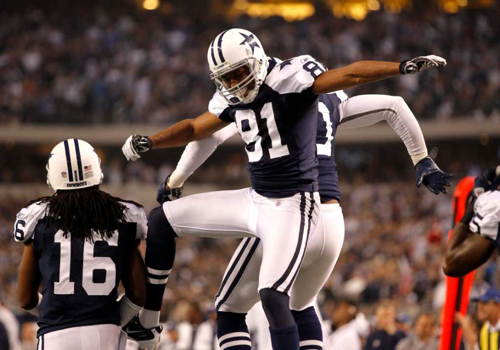 Dallas Cowboys wide receiver Laurent Robinson (81) is unable to bring in a  pass during an NFL football game against the Detroit Lions Sunday, Oct. 2,  2011, in Arlington, Texas. The Lions