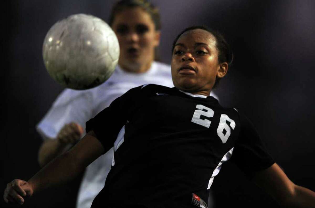 Trumbull's Taylor Pratcher controls the ball during the Class LL girls soccer state final against Glastonbury Friday, Nov. 25, 2011 at West Haven High School.
