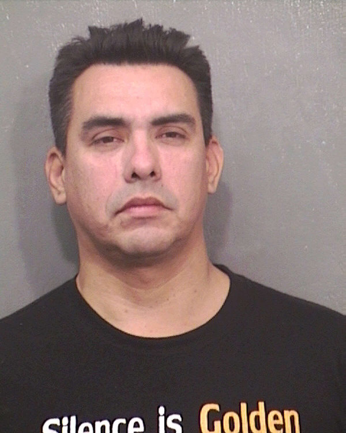 Mug is of Mario Joseph Nieto (dob 11-16-1967) arrested for robbery and impersonation of a police officer.