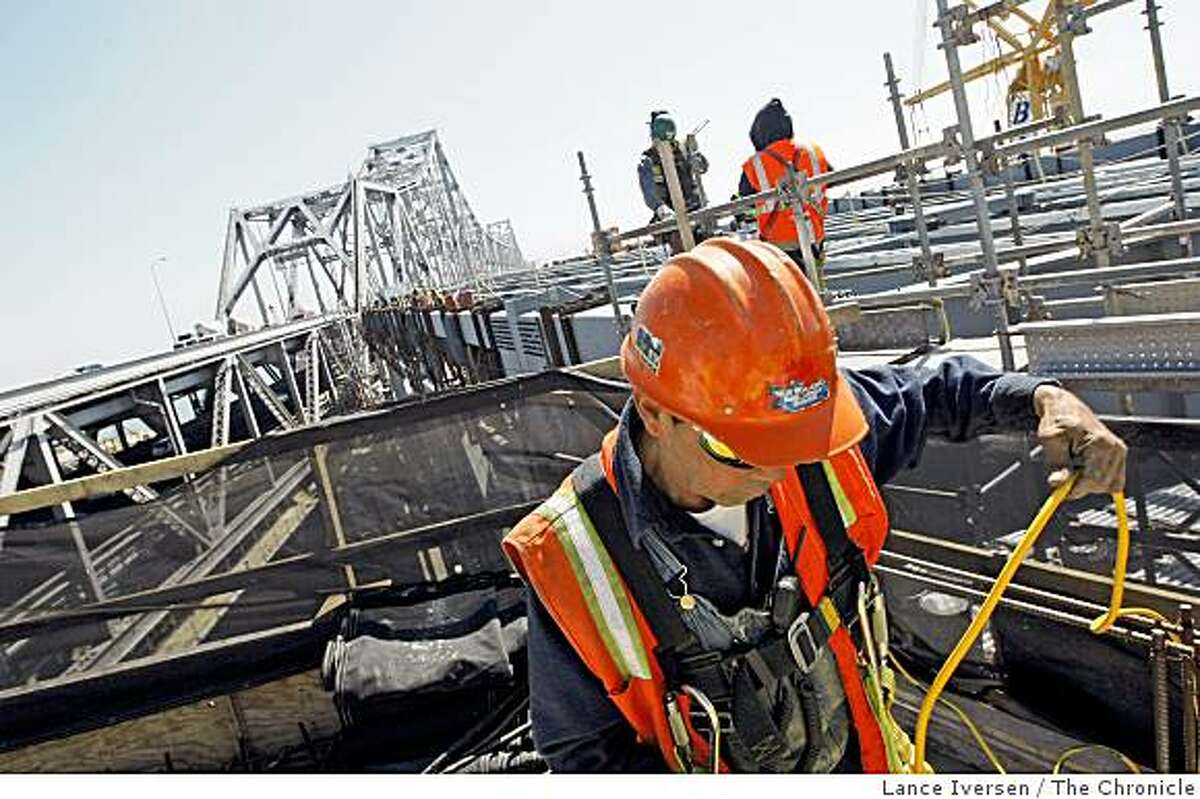 Ironworkers continue framing the 300 ft double-deck section of the Bay Bridge that will be rolled into place completing a half mile long detour structure, that will connect the East Span of the Bay Bridge to Yerba Buena Island Tunnel Labor Day weekend. Wednesday, May 20, 2009