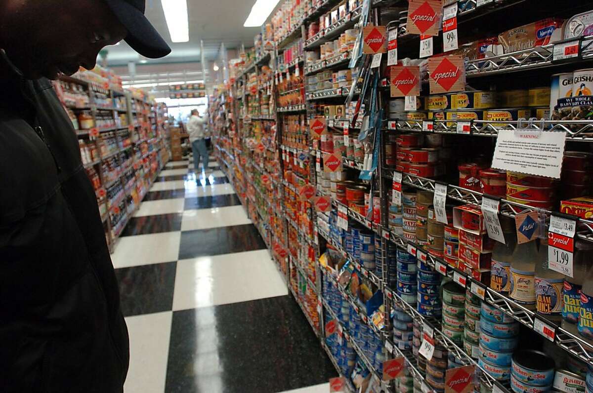 TUNA_02_EAL.JPG Art Clark of Berkeley looks at the canned fish for sale at Andronico's on Telegraph in Berkeley Friday afternoon, March 17, 2006. Andronico's is one of few grocery stores that post signs warning consumers about the dangers of mercury. CQ Event on 3/17/06 in Berkeley. Erin Lubin / For the Chronicle Ran on: 08-23-2011 Upscale Andronico's, which filed for Chapter 11 bankruptcy, got bogged down by debt during an aggressive expansion.
