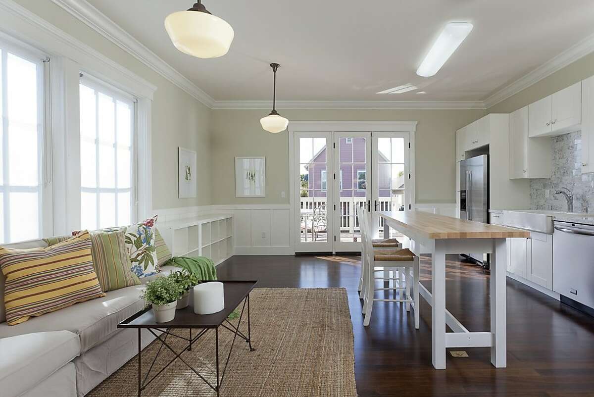 Victorianstyle home offers remodeled kitchen, radiant heat flooring