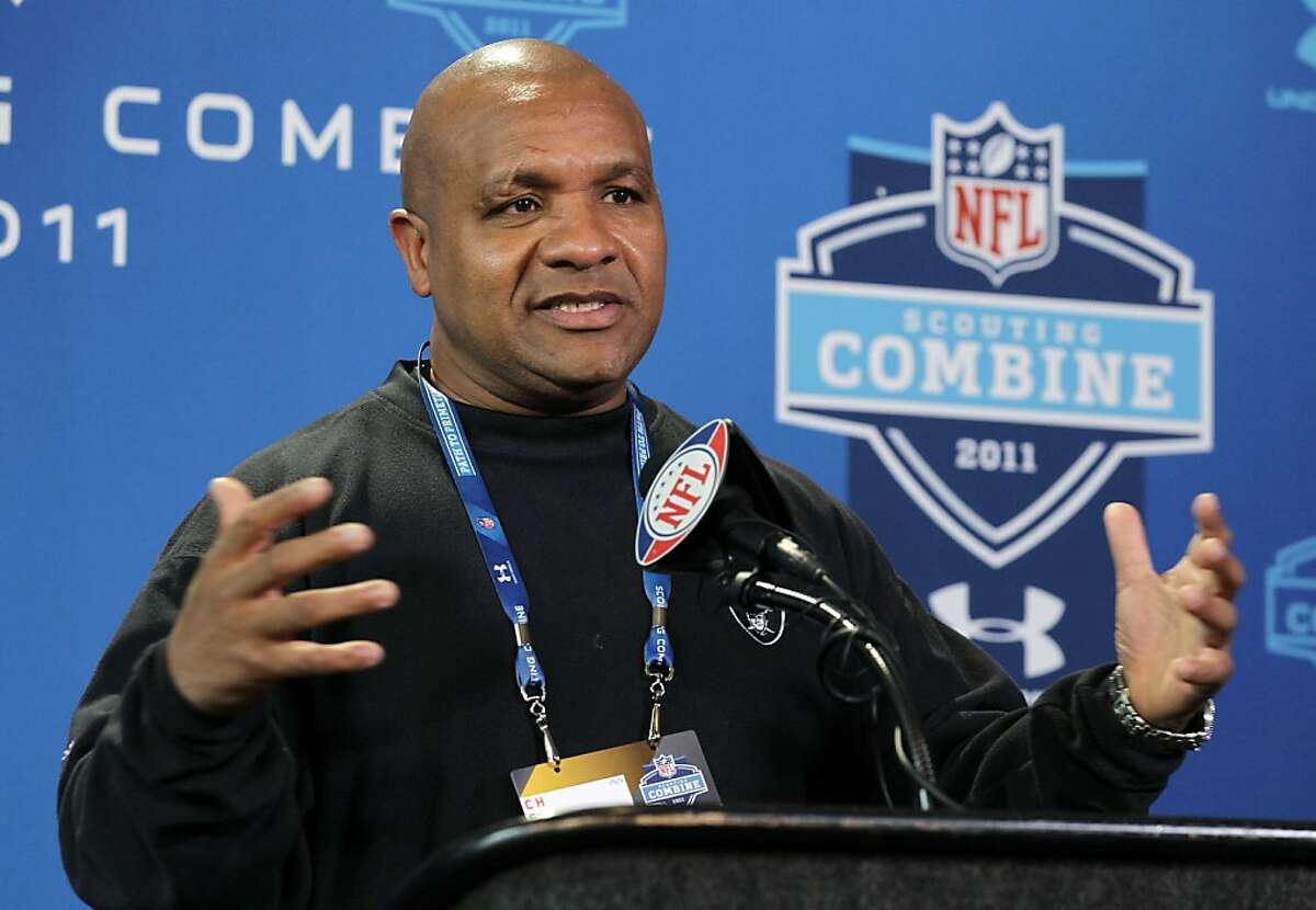 Oakland Raiders head coach Hue Jackson responds to a question during the NFL football scouting combine in Indianapolis, Thursday, Feb. 24, 2011.