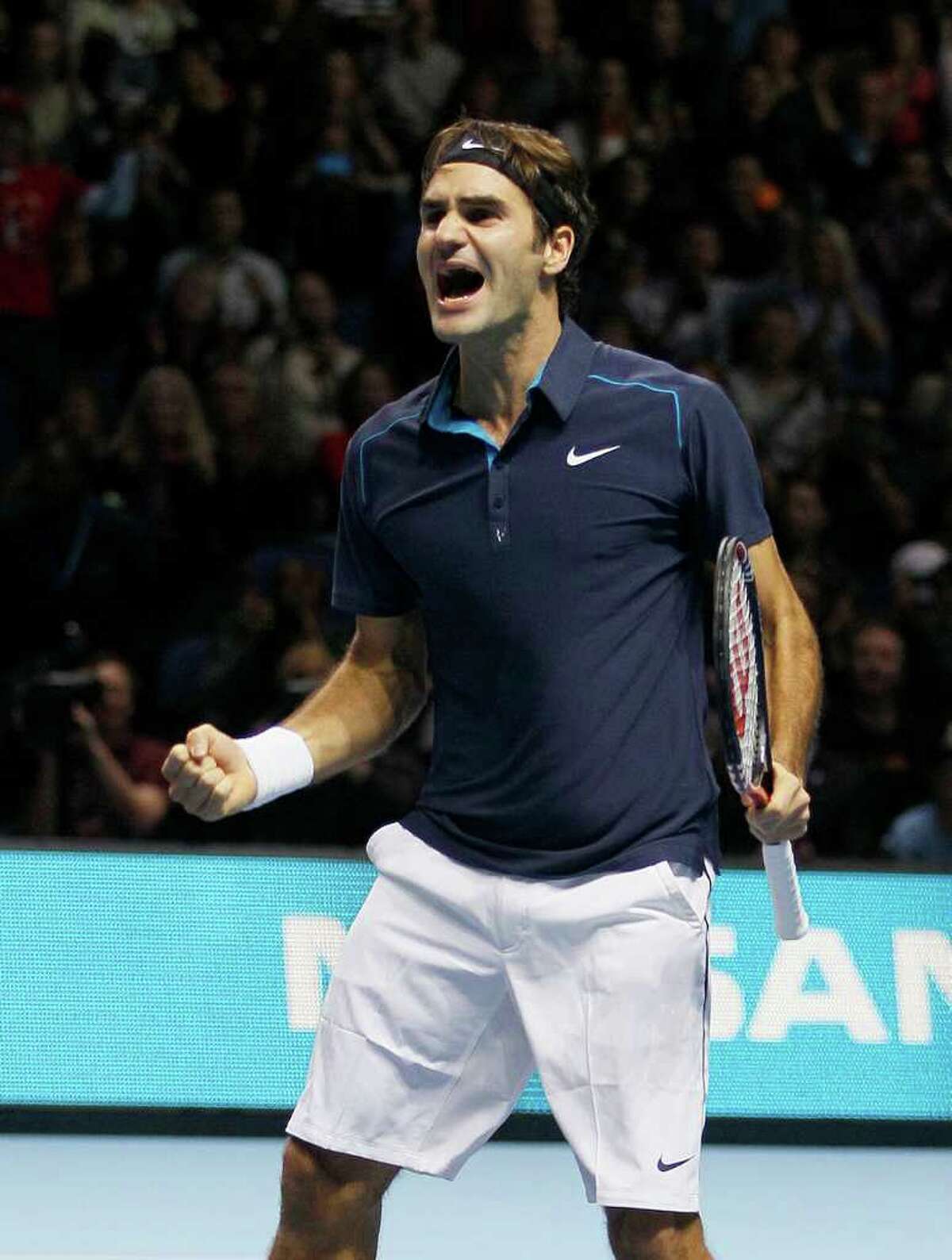 KIRSTY WIGGLESWORTH: ASSOCIATED PRESS DOWNS AND UPS: Roger Federer ends his year on a high note, even though it's his first without a Grand Slam since 2002.