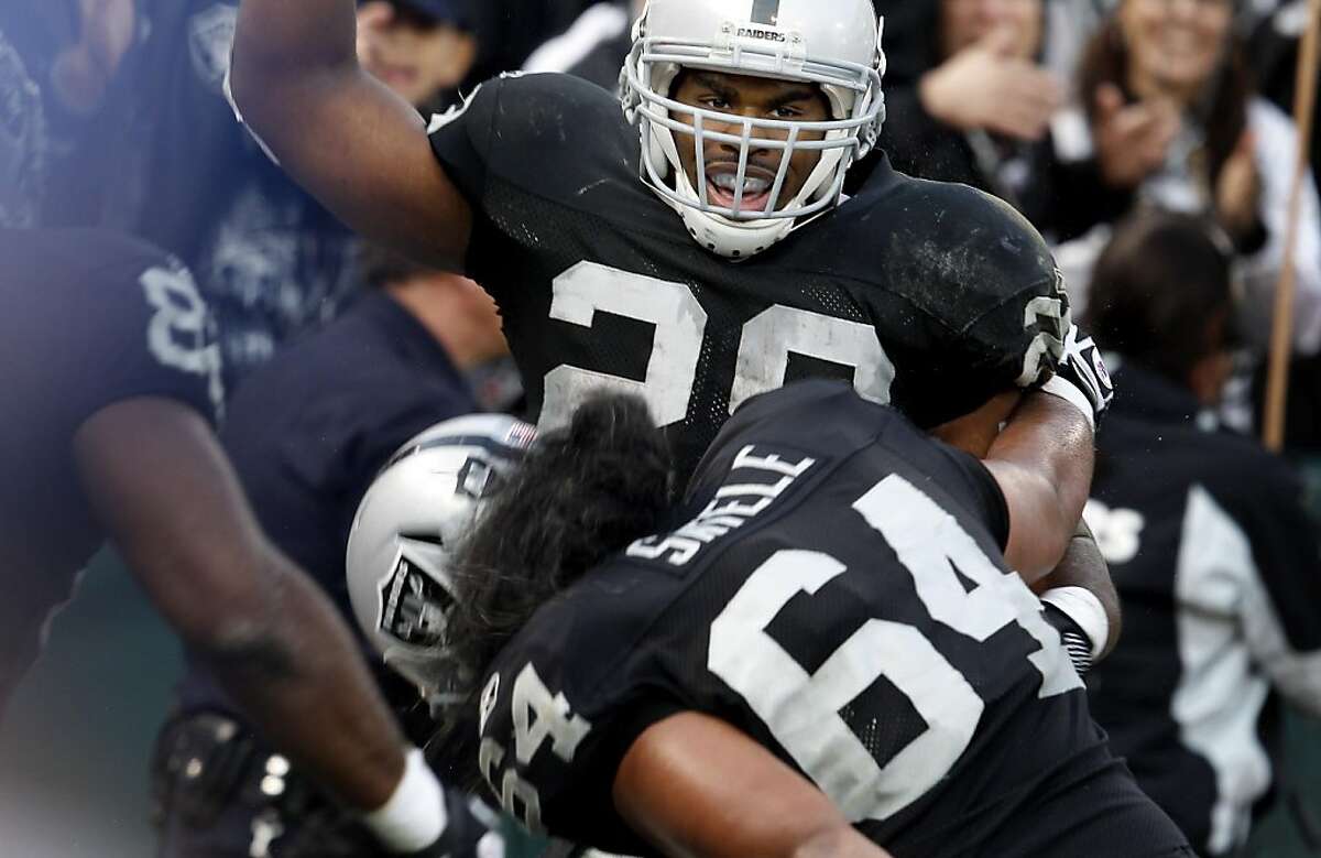 Michael Bush celebrated his touchdown late in the fourth quarter. The Oakland Raiders defeated the Chicago Bears 25-20 at O.co Coliseum Sunday November 27, 2011.