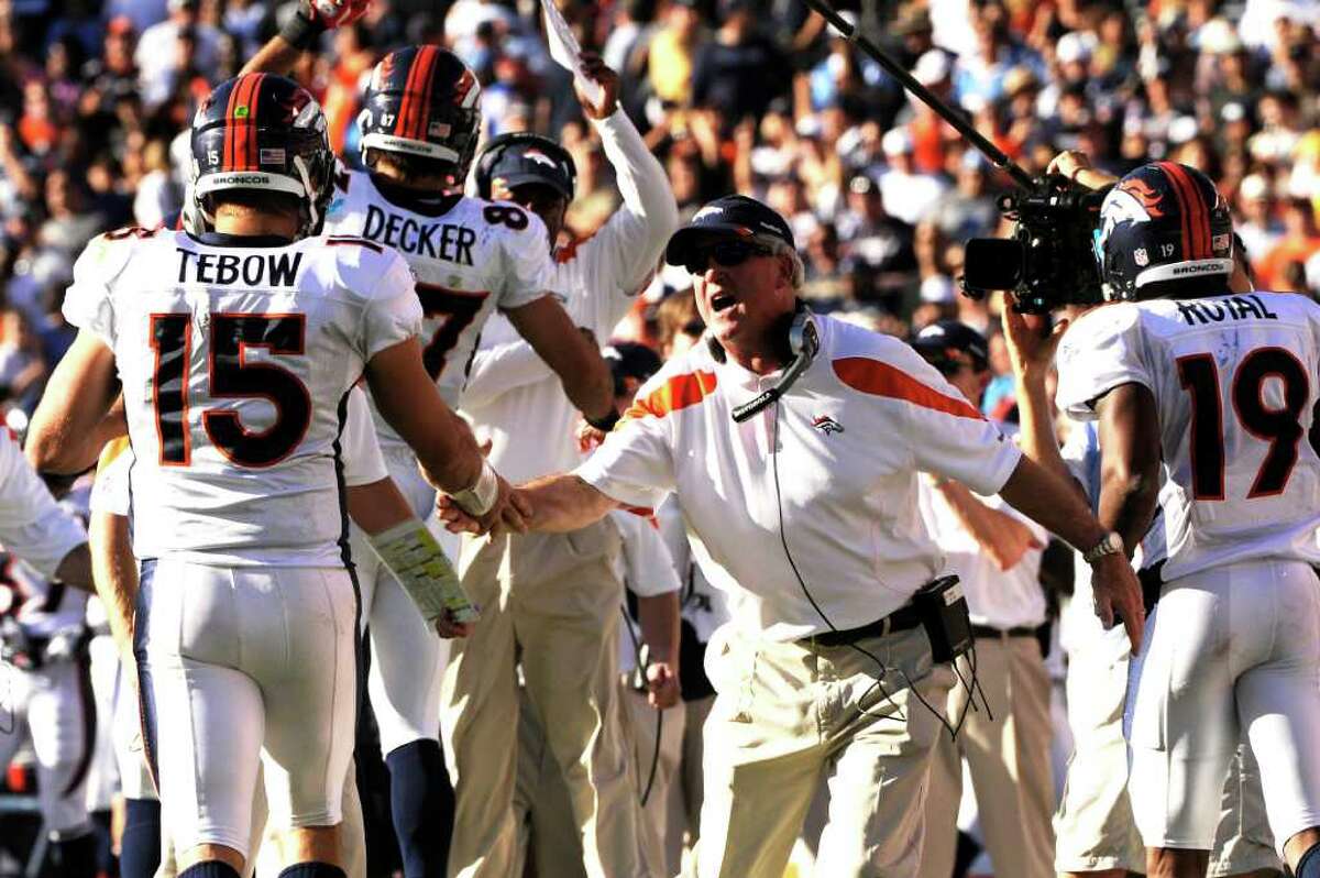 Quarterback Tim Tebow (15) celebrates a score during an NFL game