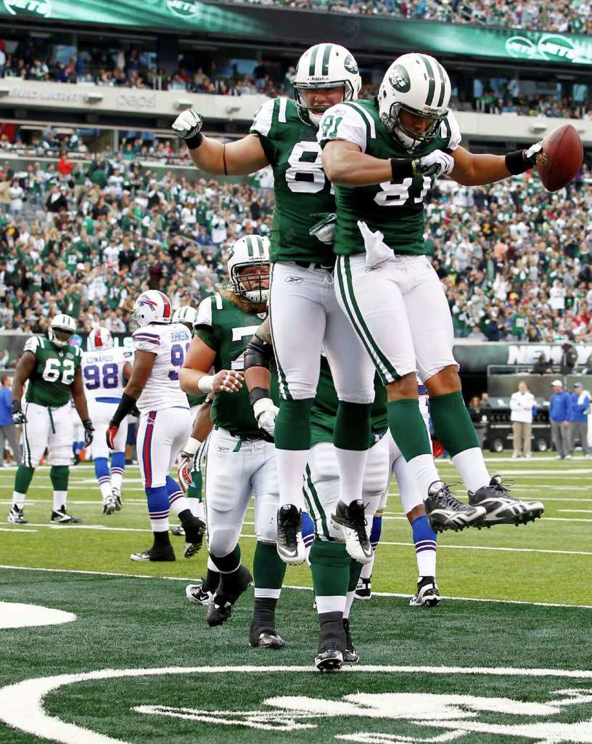 Ryan Fitzpatrick #14 of the New York Jets looks to pass against the Buffalo  Bills during the first quarter at MetLife Stad…