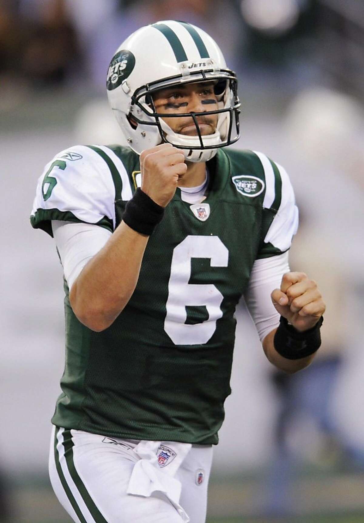 New York Jets quarterback Mark Sanchez reacts after throwing a touchdown pass to Santonio Holmes during the fourth quarter of an NFL football game Sunday, Nov. 27, 2011 in East Rutherford, N.J. The Jets defeated the Buffalo Bills 28-24. (AP Photo/Bill Kostroun) Ran on: 11-28-2011 Mark Sanchez celebrates his touchdown pass to Santonio Holmes with 1:01 left, which put the Jets ahead for good.