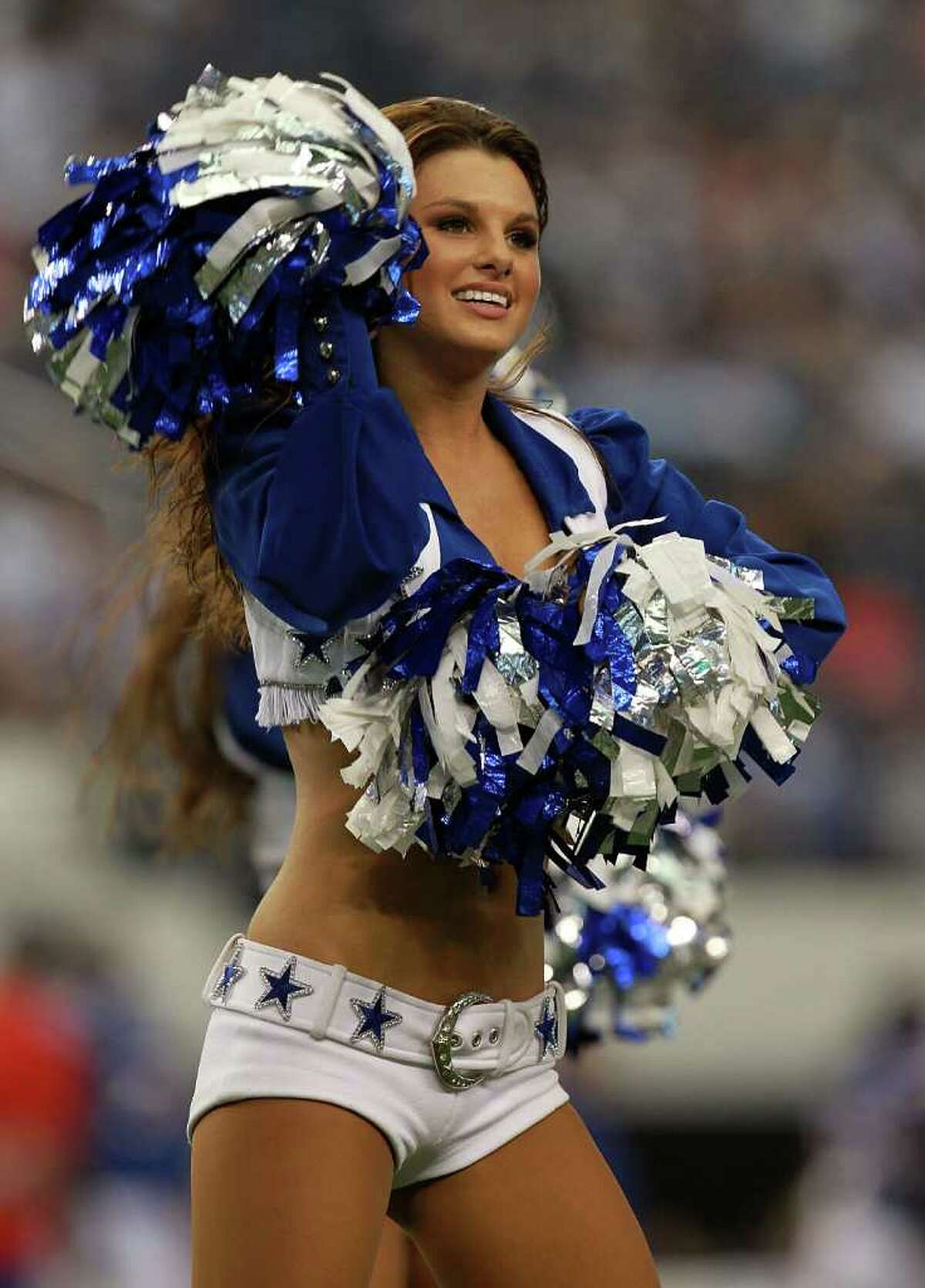 Dallas Cowboys Cheerleaders slip on swimsuits for upcoming calendar ...