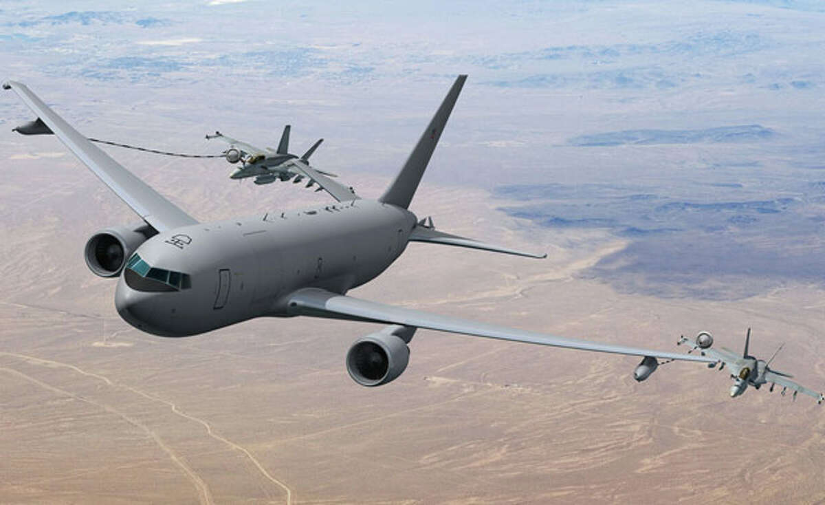 A Boeing KC-46 Tanker refuels two F/A-18 Super Hornet in this photo illustration.