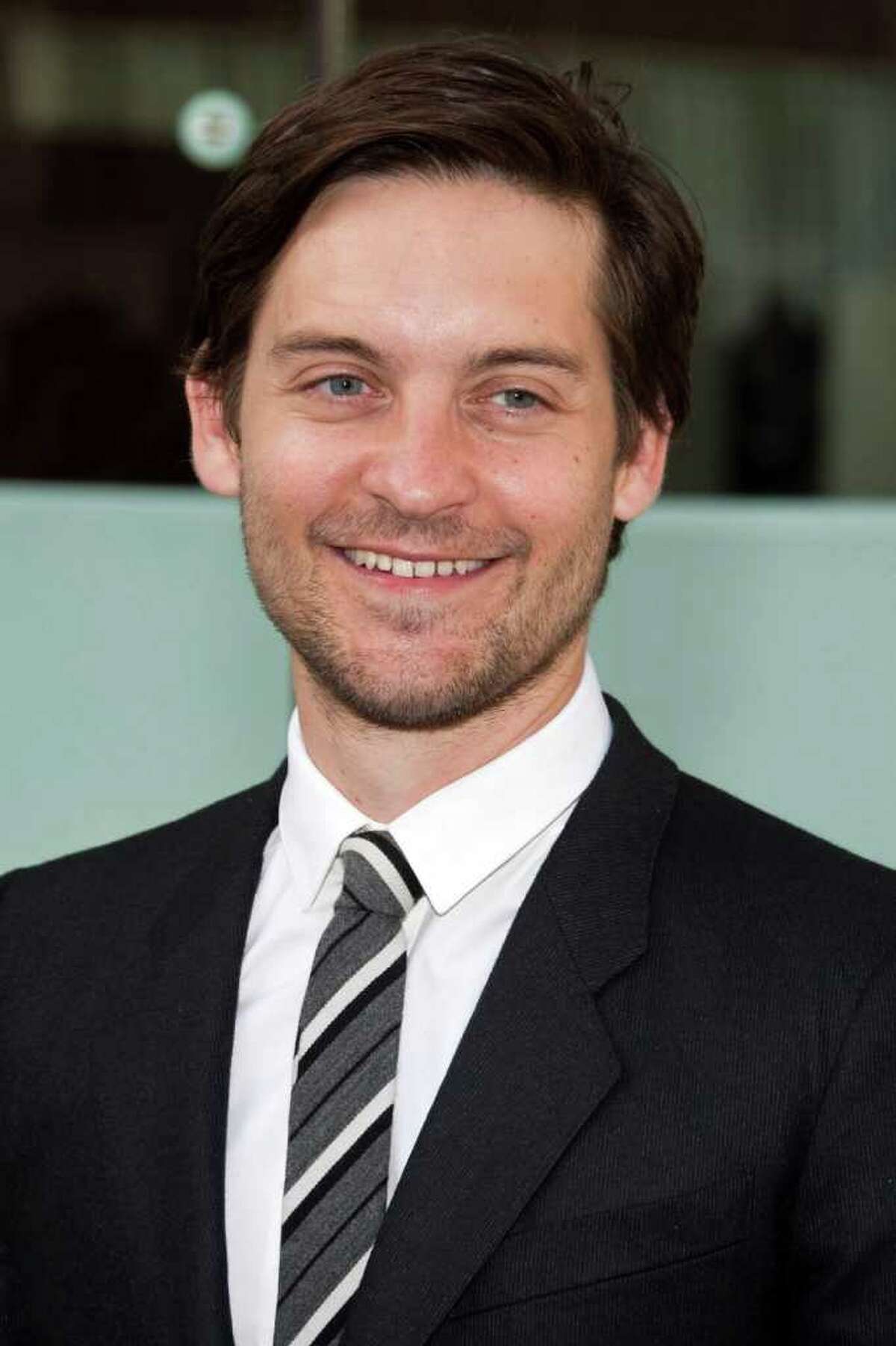 FILE - In this May 24, 2010 file photo, actor Tobey Maguire arrives to the Film Society of Lincoln Center's 37th Chaplin Award Gala honoring Michael Douglas in New York. Maguire has agreed to pay $80,000 to settle a lawsuit seeking repayment of more than $300,000 he won from a convicted con man during high stakes private poker games. (AP Photo/Charles Sykes, file)