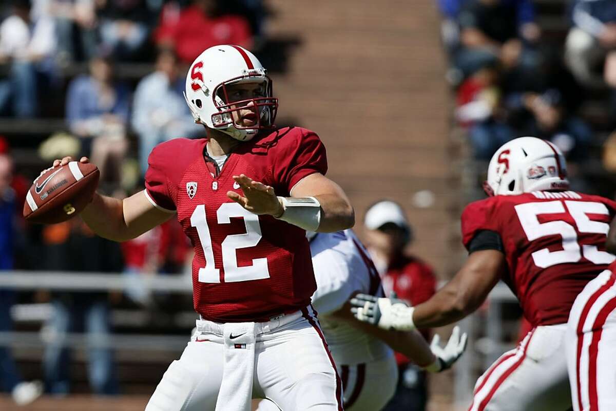 Stanford's superstar QB Andrew Luck steps into the pocket and fires a touchdown pass in the third quarter of their annual spring scrimmage game. This year's event took place at Kezar Stadium in San Francisco CA Saturday, April 9, 2011.